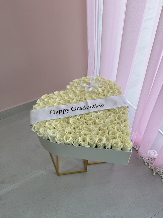 Graduation Heart Rose Box | Karaz Flowers Dubai - karazflowers.ae